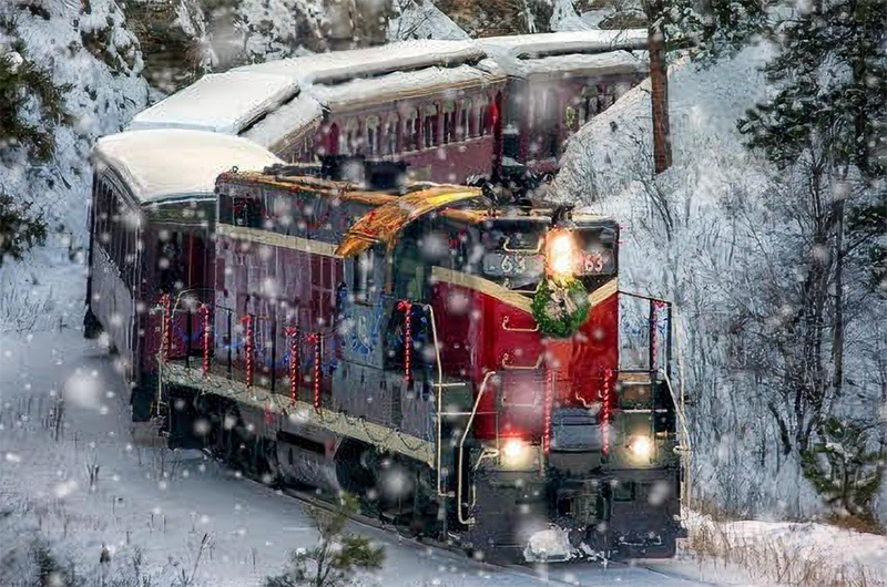 Holiday Express adorned with lights and a wreath